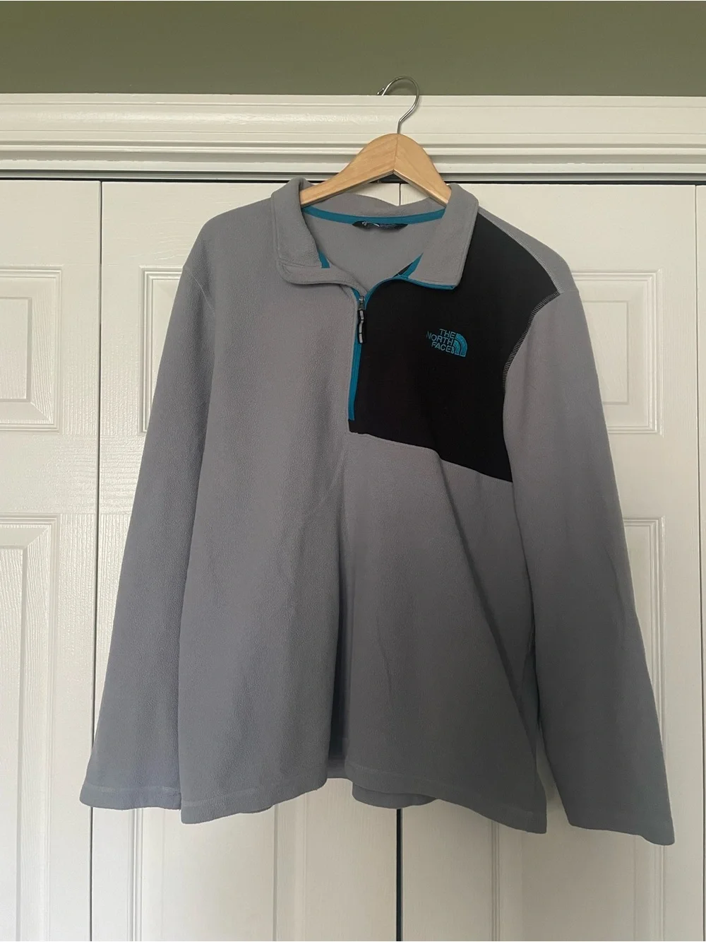 The North Face Black Fleece with Teal Logo